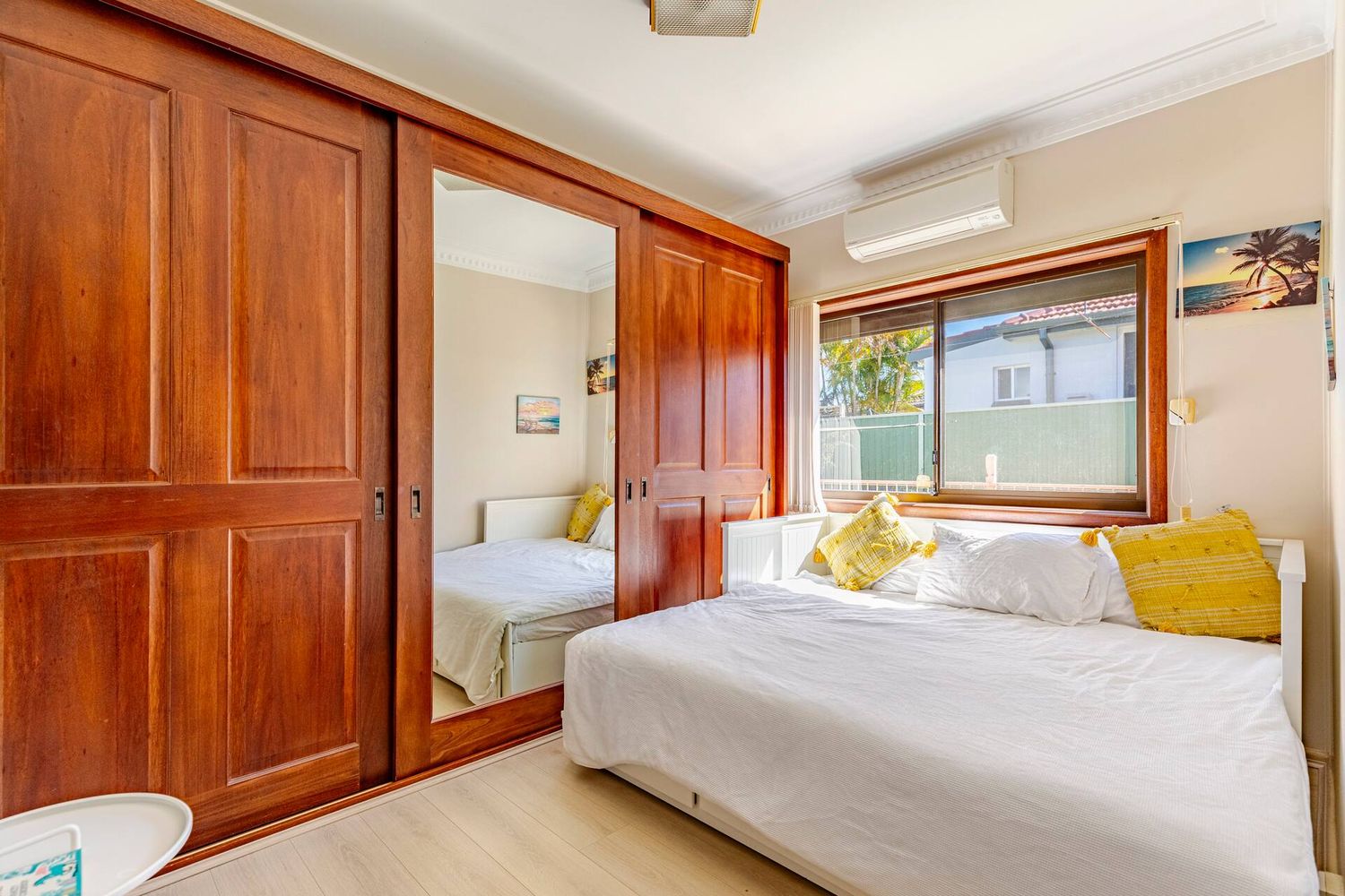 Wide view of a queen bedroom