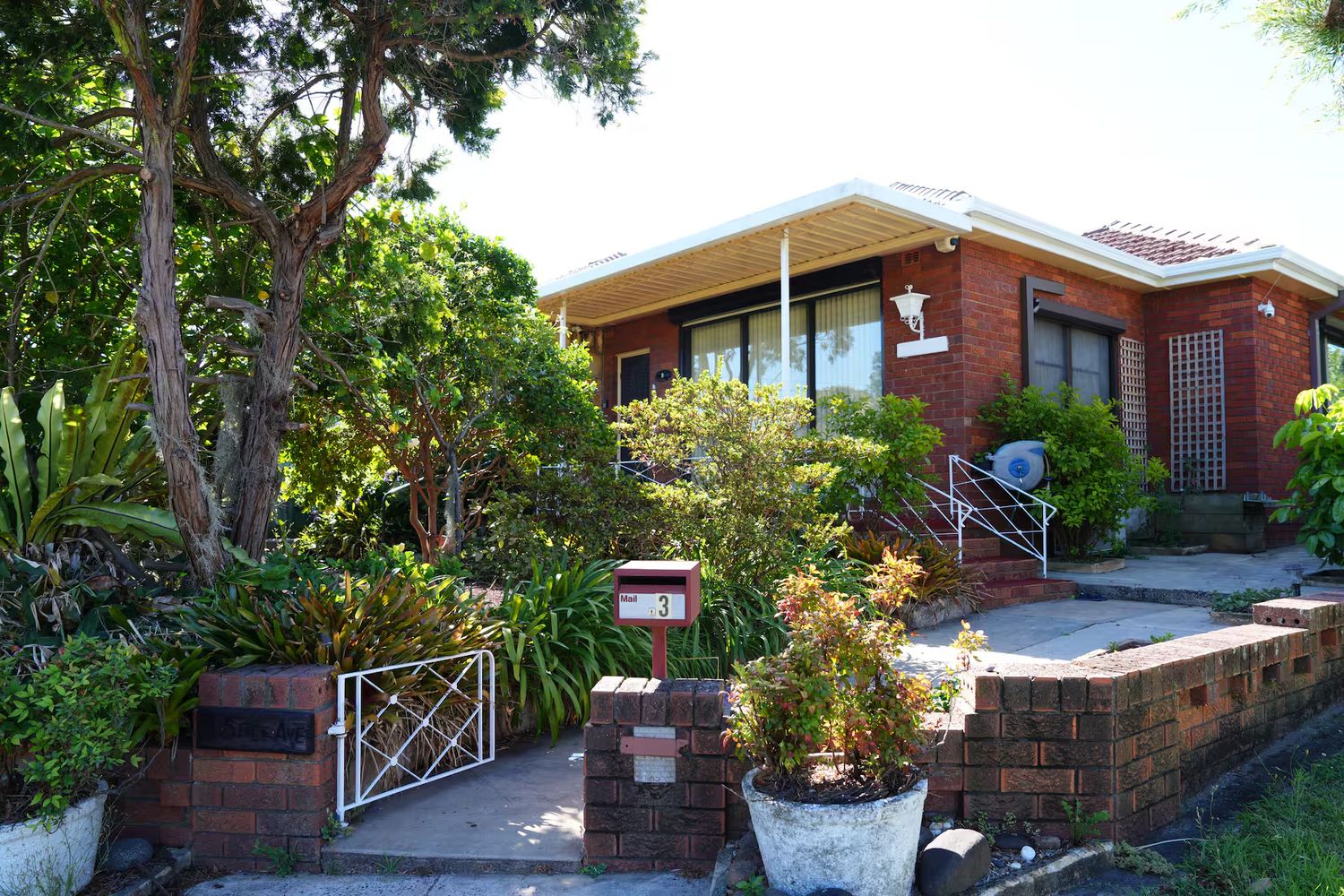 The house seen from the quiet street