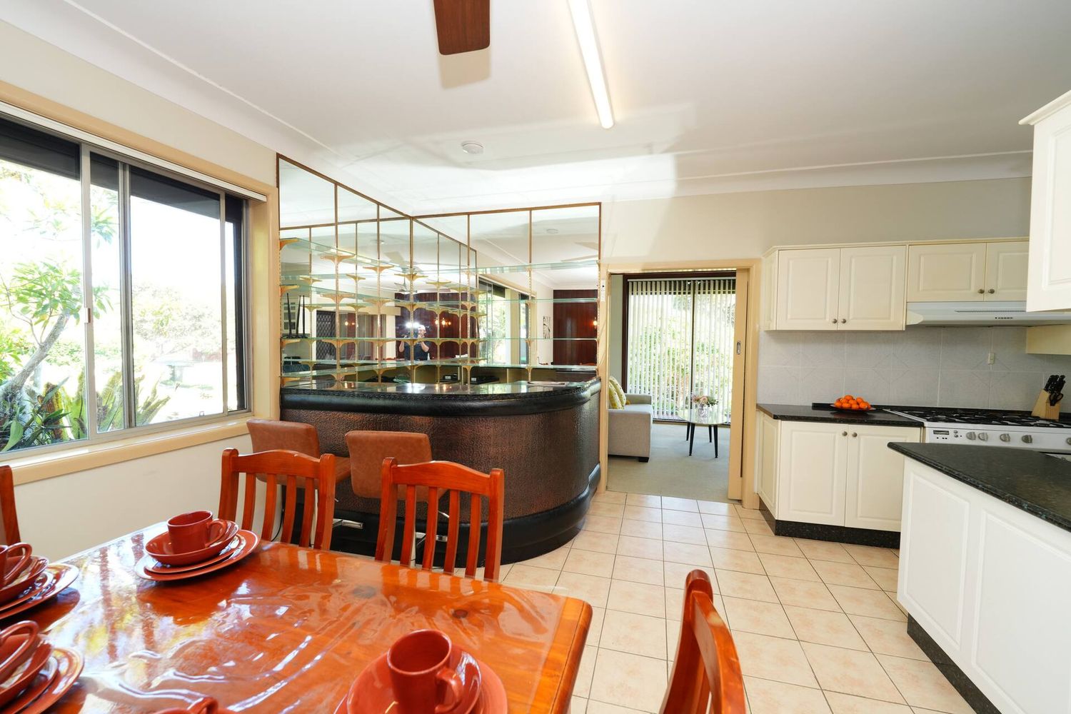 Kitchen opening through to the dining room