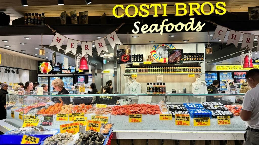 Seafood counter stacked with prawns and fish