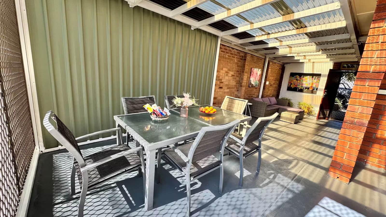 Covered terrace with outdoor dining setting